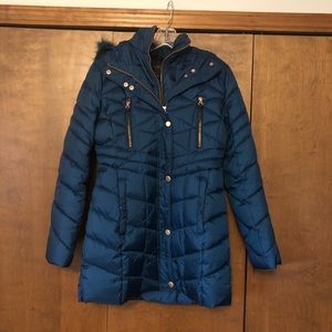 Teal quilted jacket.